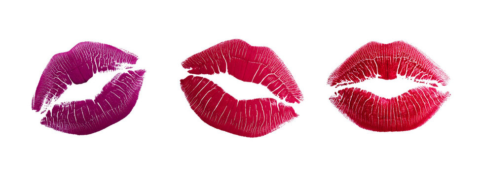 Three lipstick kiss marks in different colours, isolated on a transparent background