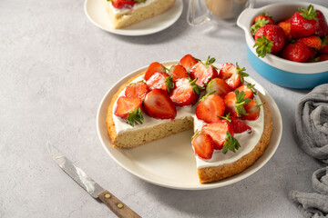 Homemade sponge cake with fresh strawberries, copy space