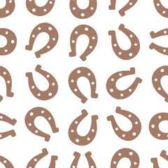 Lucky chocolate horseshoe silhouette. Seamless vector pattern. Endless ornament. Isolated colorless background. Flat style. Repeating symbol of happiness and good luck. Idea for web design.