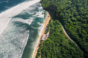 High angle view background of tropical coast cliffs and blue sea in Bali, Indonesia