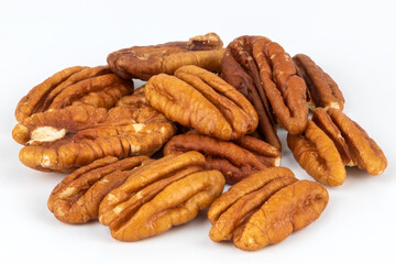 Pecan halves on a white background. Nuts.