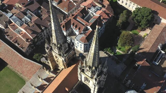 Gothic spiers of Bayonne Cathedral, France. Aerial top-down orbiting