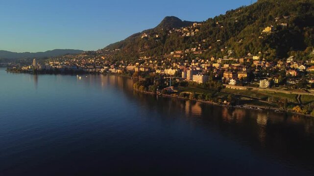 Aerial Cinematic Views of Veytaux: The Tranquil Shores of Lake Geneva, Switzerland.