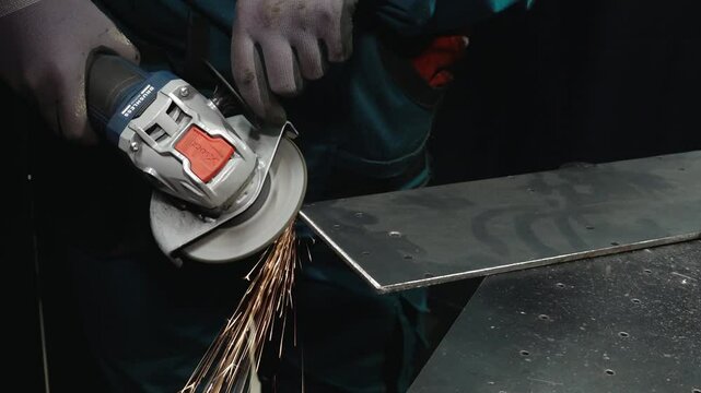 Close-up of a grinding wheel cutting or shaping a metal surface, producing vibrant sparks. A powerful depiction of industrial work and precision.