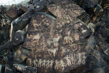 Petroglyphs in Tamgaly. Tamgaly is a petroglyph site in the Almaty region of Kazakhstan. Tamgaly became a UNESCO World Heritage Site in 2004. Tamgaly is located 170 km  northwest of Almaty.
