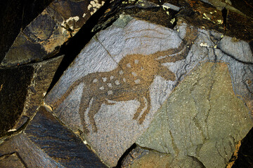 Petroglyphs in Tamgaly. Tamgaly is a petroglyph site in the Almaty region of Kazakhstan. Tamgaly became a UNESCO World Heritage Site in 2004. Tamgaly is located 170 km  northwest of Almaty.