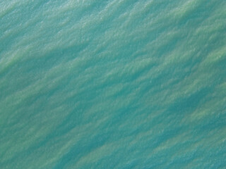 Aerial perspective: mesmerizing drone view of the vast expanses of the Baltic Sea, playing with shades of blue and green.