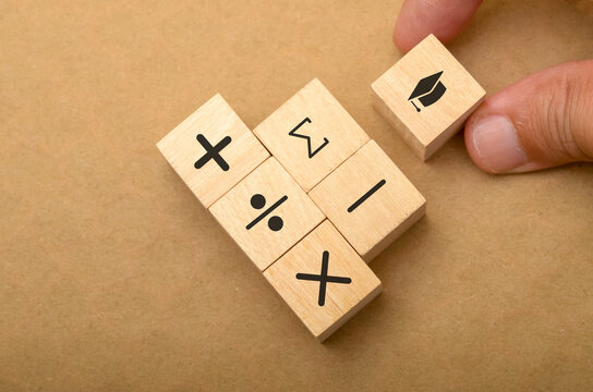 Love for Learning Math: Wooden Blocks with Symbols and Graduation Cap in Heart Shape - Powered by Adobe