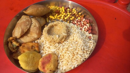 Food items consumed by Bengalis during Makar Sankranti festival are Narkel Naru (coconut sweet made...