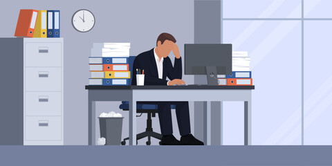 Exhausted businessman working in the office