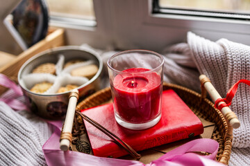 shortbread Danish cookies, red candle, red and pink silk ribbons, Valentine's Day, romantic atmosphere, Valentine's Day gift, delicious dessert for the holiday, tea cookies