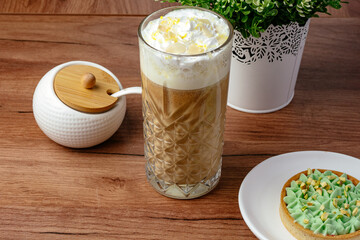 coffee in a cup and dessert on a plate