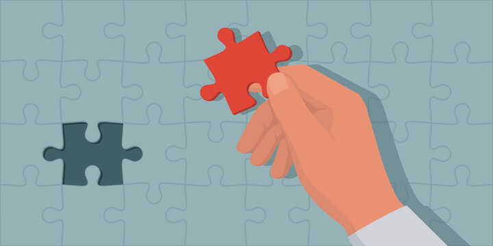 Man completing a jigsaw puzzle