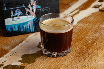 coffee in a cup and dessert on a plate