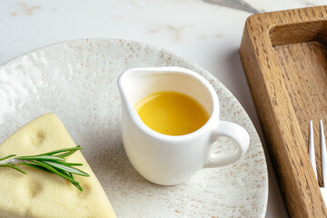 coffee in a cup and dessert on a plate