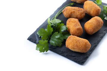 Fried cod croquettes isolated on white background. Traditional spanish food