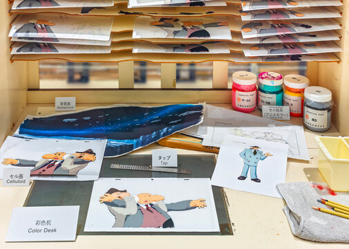 ikebukuro, japan - jan 16 2024: Japanese Color Desk on display at the free admission Tokyo Anime Station museum showcasing tools used in traditional celluloid animation such as the anime Astro Boy.