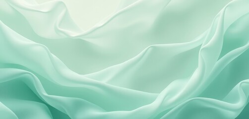 Obraz premium Mint green fabric folds in soft flowing texture.