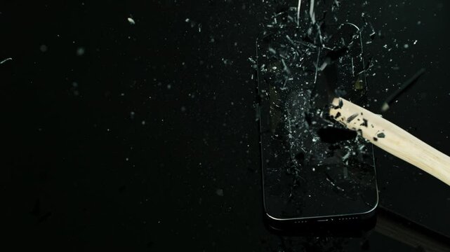 Super Slow Motion Shot of Hammer Breaking Mobile Phone Glass at 1000fps.