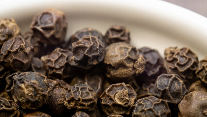 black pepper seeds, peppercorn spice close up, macro photo