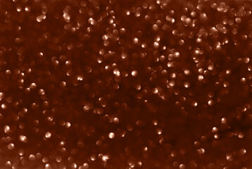 Mocha brown sequins background. Perfect texture for your design. Demonstrating color of 2025 year