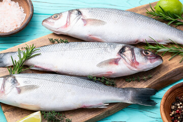 Raw sea bass fish photography . Top view