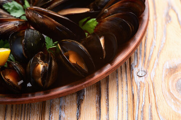 Mussels with parsley on a plate photography