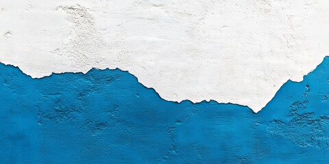 Obraz premium Blue and white wall texture with a distinct wavy edge emphasizing the contrast of colors and surface detail prominent in the upper half of the image