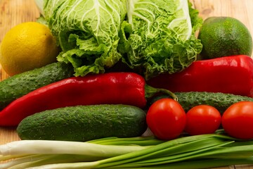 composition with fresh vegetables and fruits on wooden background