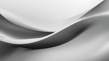 Flowing curves of gray and white fabric create a harmonious abstract composition