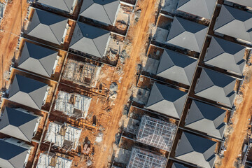 Aerial view of the residential site under construction. Building  houses.
