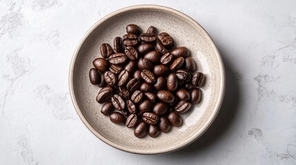 Fototapeta premium A plate filled with roasted coffee beans.