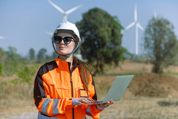 Engineer technician worker checking service maintenance wind turbine clean electricity power station
