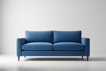 Fototapeta premium a close up of a blue couch against a white wall