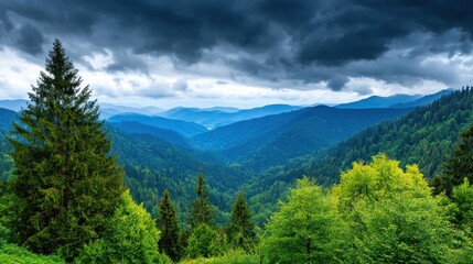 Obraz premium A serene mountain landscape under a dramatic cloudy sky.