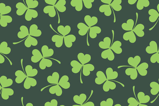 Seamless pattern of clover leaves for St. Patrick's Day. Clover leaves on green background. Suitable for wrapping paper, wallpaper, background, card and decoration. Vector
