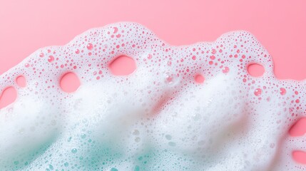 Fototapeta premium Close-Up Macro Photo of Soap Foam and Bubbles on a Pink Background: Banner with Copy Space for Laundry, Cleaning Services, Beauty, and Skin Care Concepts