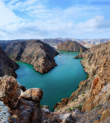 An aerial view of Bandar Al Khairan, Beautiful landscape with mountains and sea. Most popular place for vacation, holiday and adventure. best tourist spot near the Muscat for traveler. Oman.