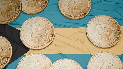 Several bitcoins are laid out on the flag of Bahamas