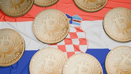 Several bitcoins are laid out on the flag of Croatia