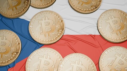 Several bitcoins are laid out on the flag of Czech