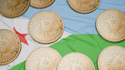 Several bitcoins are laid out on the flag of Djibouti
