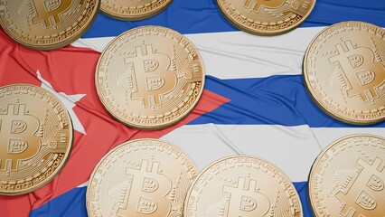 Several bitcoins are laid out on the flag of Cuba