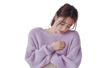 sick woman blowing her nose