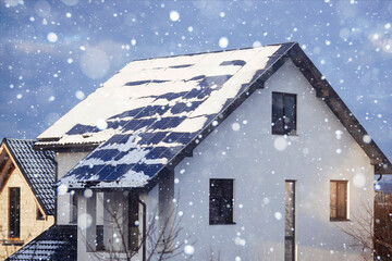 Solar Panels in Winter of House Roof Snow Covered. Solar Panel Efficiency  in Winter.