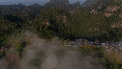 Clouds on high mountain peaks in the rainy season in the Asian rainforest..