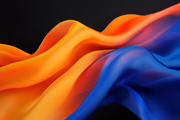 Obraz premium Fluid Abstract: A captivating abstract image featuring vibrant, flowing silk fabric in a rich, warm orange and cool blue color gradient.