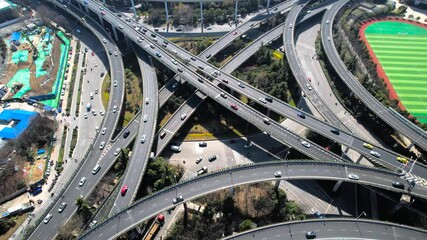 Elevated interchange showcasing busy urban traffic and transportation patterns in a modern city