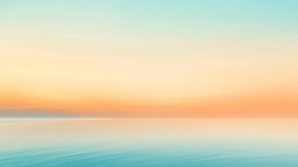 Obraz premium A calming gradient background with dawn beach colors.featuring soft oranges and blues.evoking peace and tranquility.ideal for nature-themed content and morning designs
