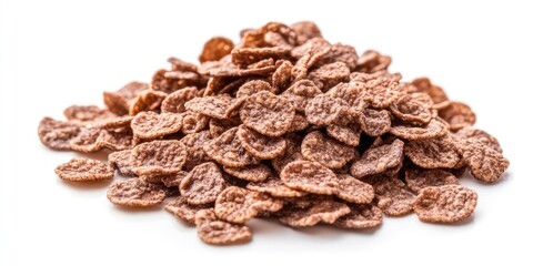 Obraz premium Brown chocolate corn flakes piled high on a white background showcasing crisp texture and healthy snack appeal in a vibrant arrangement.